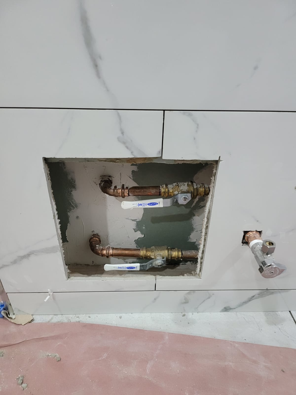 Exposed plumbing during renovation